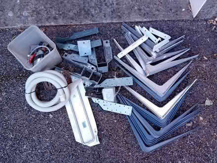 Photo of free Assorted metal brackets and fixings, plus plumbing sundries (Moorfields BA2) #1