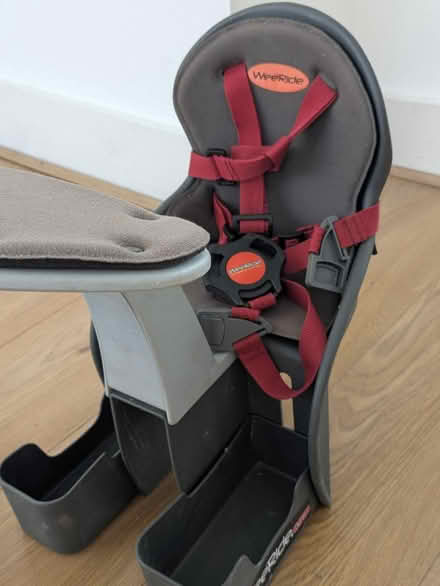 Photo of free WeeRide bike seat (missing screw) (W1W 5EB) #1