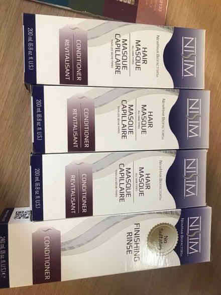 Photo of free Expired Nisim conditioner (Burnham SL1) #1