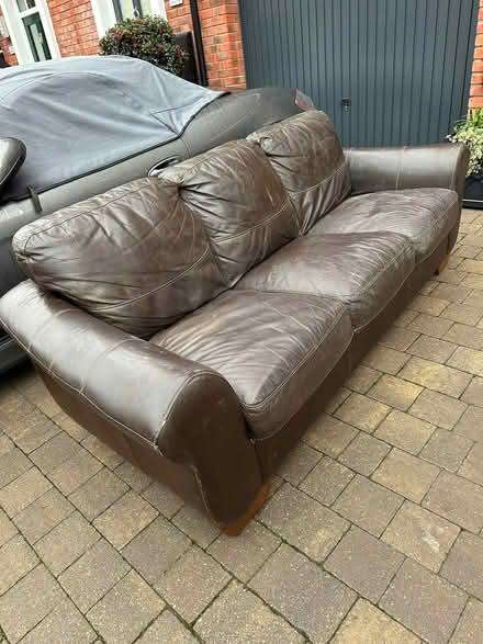 Photo of free Brown leather three seater sofa (Shrewsbury SY2) #1