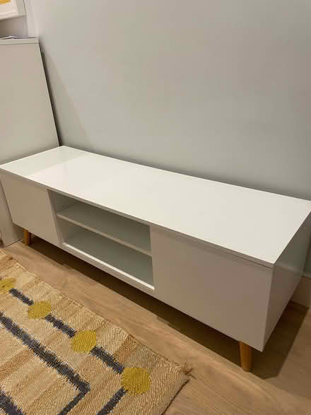 Photo of free White TV stand with wooden legs (Fulham Palace Rd SW6) #2