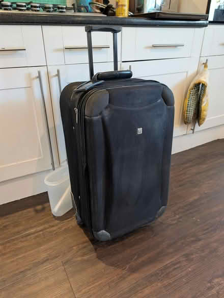 Photo of free Medium suitcase (Penrhyn Bay LL30) #1
