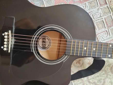 Photo of free Black guitar, with case, spare strings and plectrums (Hulme M15) #4