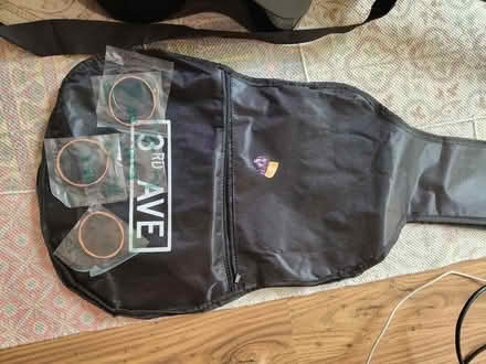 Photo of free Black guitar, with case, spare strings and plectrums (Hulme M15) #3