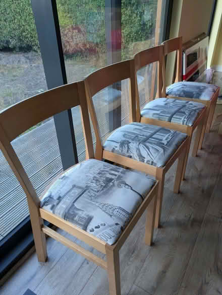 Photo of free Set of 4 dining chairs - NY skyline covers (Old Woking GU22) #1