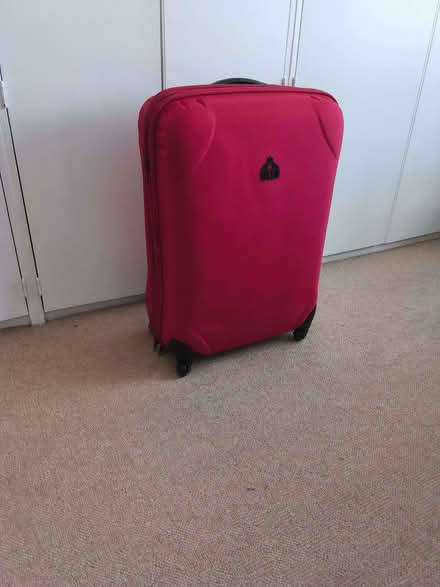 Photo of free Large red expandable suitcase (Allerton L18) #1