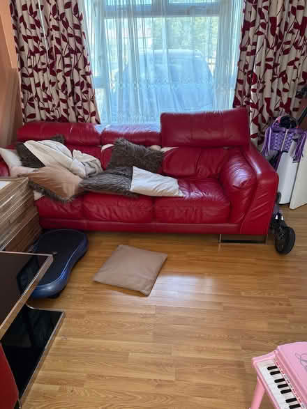 Photo of free Red DFS sofa (Barking IG11) #1