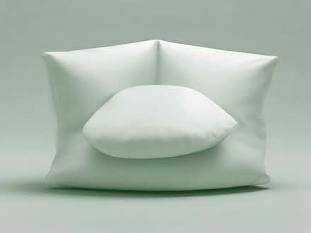 Photo of free Wedge cushion with white cover. Good condition (Hurstpierpoint BN6) #1
