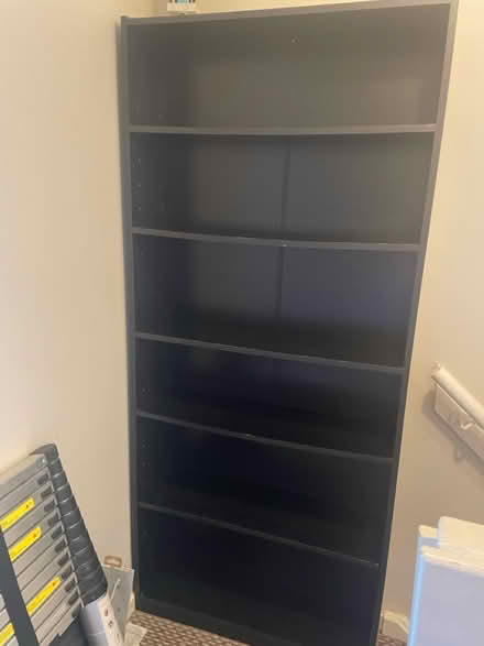Photo of free Tall black bookcase (B32 Bartley Green) #1