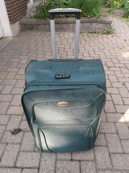 Photo of free Suitcase on 4 wheels by Voyageur (Near Baseline Rd. & Clyde Ave.) #1