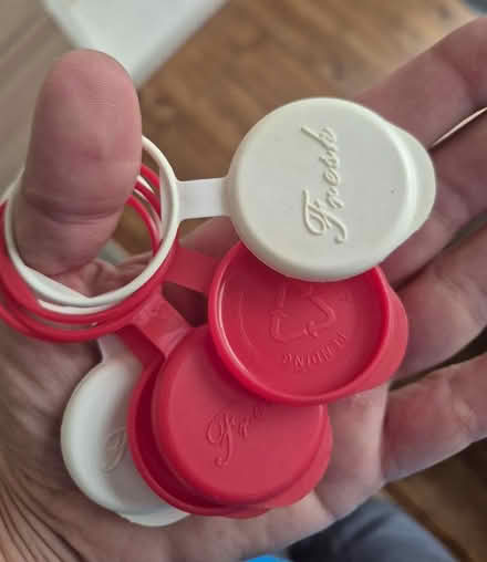 Photo of free 1 pint "milkman" glass bottle plastic tops (Battle RG30) #1