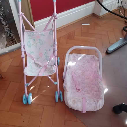 Photo of free Dolls pram and carrier (Denton's Green WA10) #1