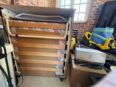 Photo of free Single bed in a folded cupboard on castors ideal for an occa (Funtington PO18) #2