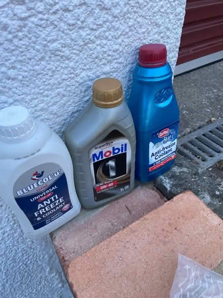 Photo of free 1/2 bottles antifreeze , oil 0W-40 (Wallands Park BN7) #1