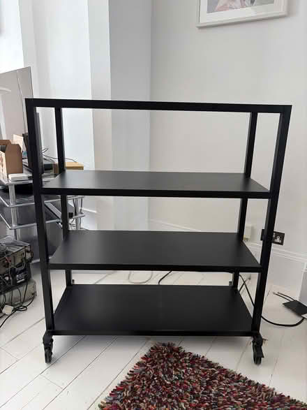 Photo of free Black metal shelves on wheels (Streatham Common) #1