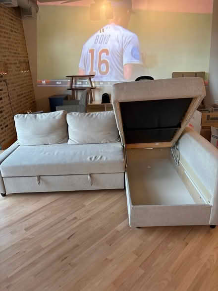 Photo of free IKEA pullout couch with storage (Madison st and Des plaines) #1