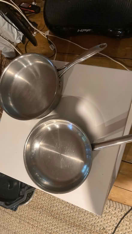 Photo of free Couch table rug books and frypans (Belgrave) #1