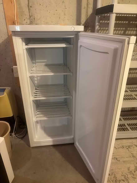 Photo of free Upright freezer (Near Lexington st) #1