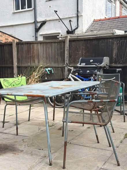 Photo of free The Rusty Table & Chairs and two bikes (Woodhey CH63) #1