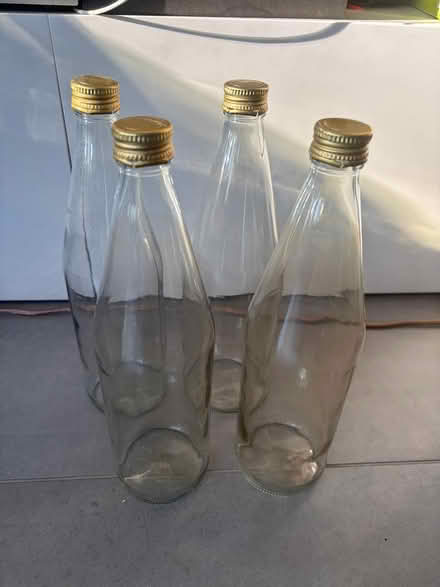 Photo of free Set of 4 1 litre glass bottles (Union Street, Borough SE1) #1