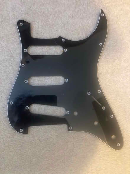 Photo of free Stratocaster scratchplate (black) (Iffley Road OX4) #1