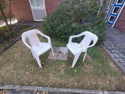 Photo of free Four plastic garden chairs (Gorse Hill M32) #1