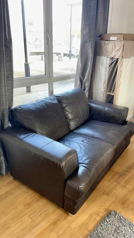 Photo of free Brown 2 seater leather sofa (Lambeg, Lisburn BT27) #1