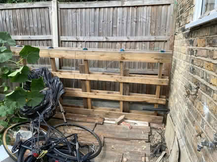 Photo of free Large wooden pallets x3 (N13 Palmers Green) #2