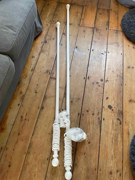 Photo of free White wooden curtain poles x 2 (Whetstone N20) #1