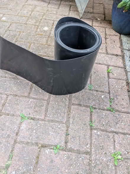 Photo of free Roll of black plastic lawn edging (Shepshed LE12) #1