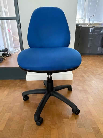 Photo of free Blue swivel office chair on wheels, no arms (Putney SW15) #1