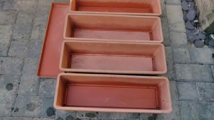 Photo of free 4 windowsill flower pots with bases (Baldock (SG7)) #1
