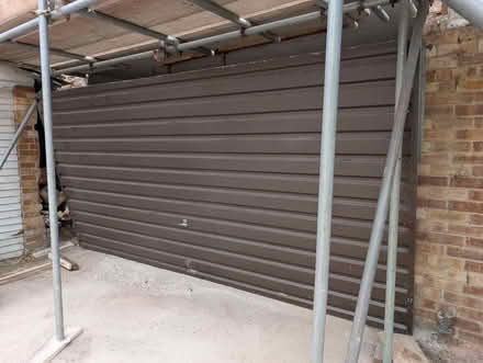 Photo of free Brown metal garage door (Wickham PO17) #3
