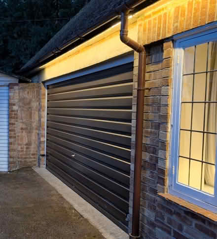 Photo of free Brown metal garage door (Wickham PO17) #1