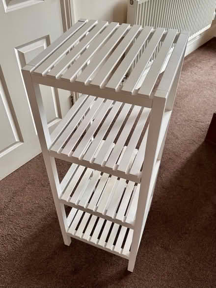 Photo of free White wooden four-tier shelving unit (Marple Bridge SK6) #1