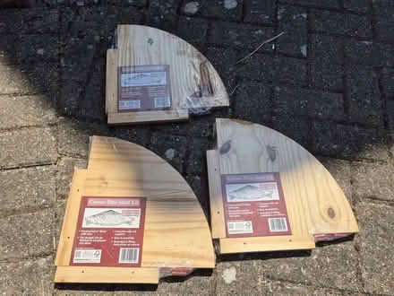 Photo of free Wooden corner shelves new (Byfleet KT14) #1