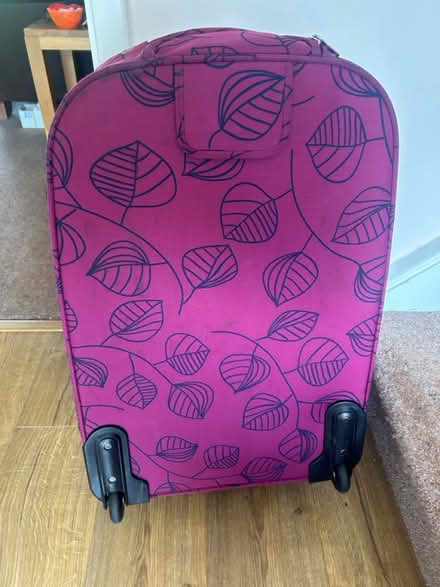 Photo of free Purple suit case with wheels (Hemel Hempstead HP3) #3