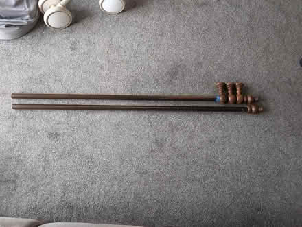 Photo of free Curtain poles 3m dark wood 35mm with rings (Heaton Norris SK4) #2
