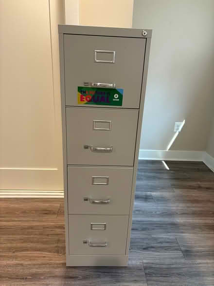 Photo of free 4-drawer filing cabinet (Woodridge near Perry School) #1