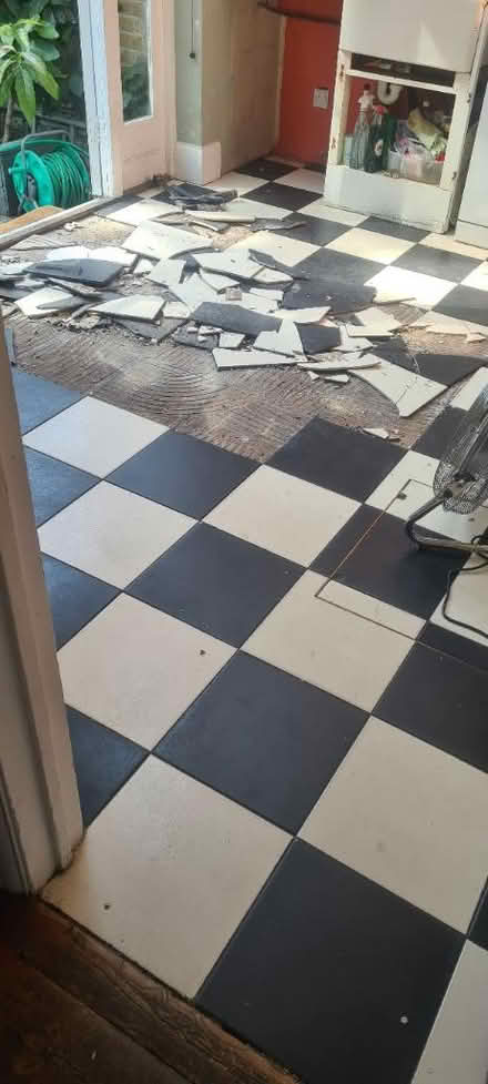 Photo of free Broken up tike floor (Northfields) #1