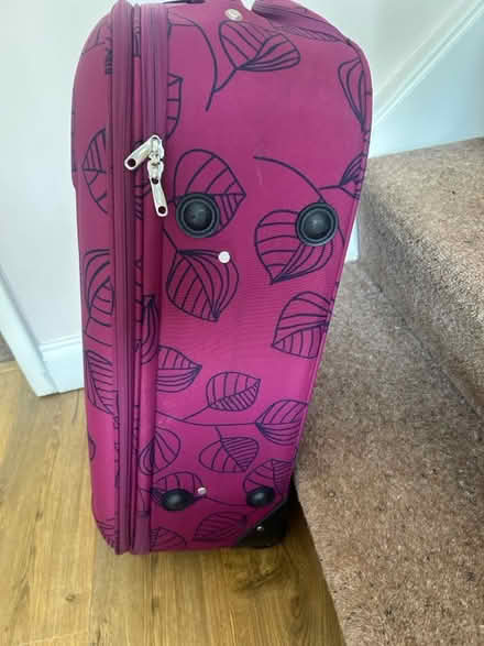 Photo of free Purple suit case with wheels (Hemel Hempstead HP3) #1