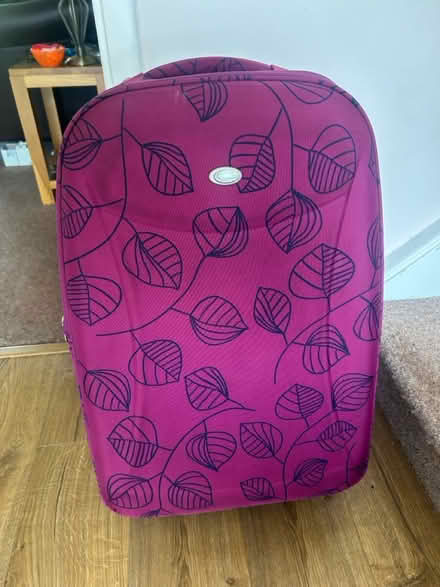 Photo of free Purple suit case with wheels (Hemel Hempstead HP3) #2