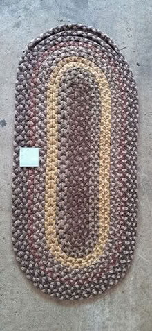 Photo of free 46 inch x 22 inch braided rug #1