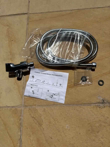 Photo of free New: shower hose and parts (Derbyshire Dr & Robindell Way) #1