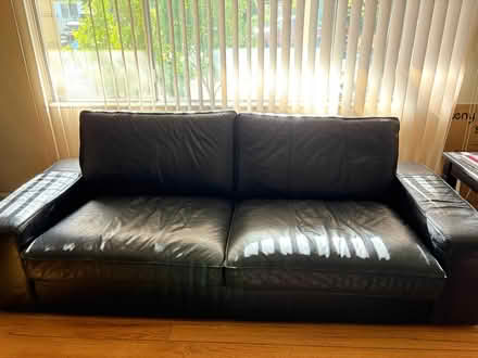 Photo of free Black leather sofa (East Bay) #1