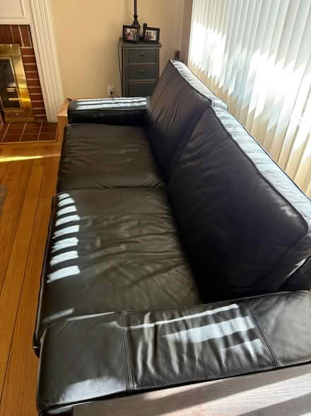 Photo of free Black leather sofa (East Bay) #2
