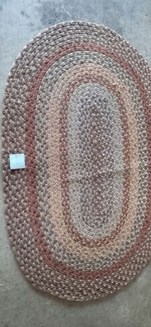Photo of free 64 inch x 44 inch braided rug #1