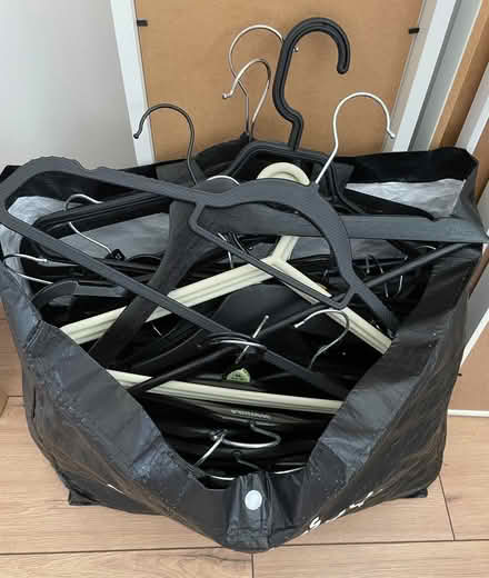 Photo of free Bag of assorted clothes hangers (Welling DA16) #1