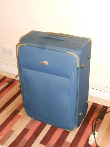 Photo of free Large suitcase (Egley Road, Woking) #1