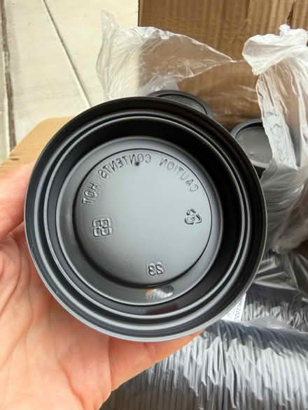 Photo of free 850 Black Hot Cup Travel Lids (Darien - near 75th x Cass Ave.) #3